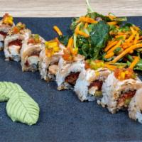 Bake Yellowtail Roll · Spicy tuna, cucumber, cream cheese, topped with baked yellowtail, spicy ponzu sauce, mango p...
