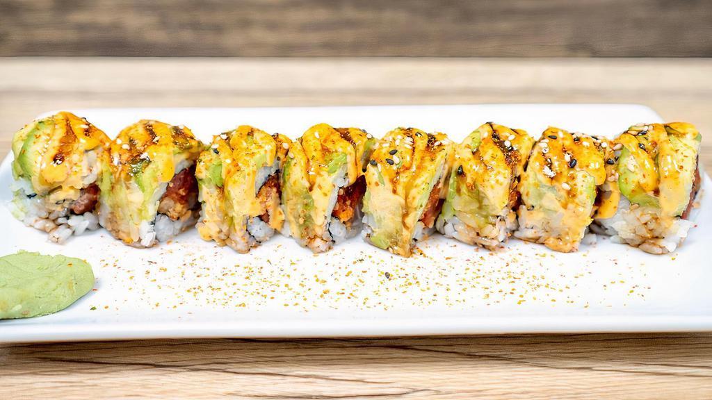 Arizona Roll · Spicy salmon, spicy yellowtail, spicy tuna, tempura crunch, topped with avocado, eel sauce and spicy mayo.