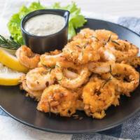 Calamari Basket (20) · Comes in 10 pieces of lightly dusted rings, tentacles and your choice of regular, cajun or s...