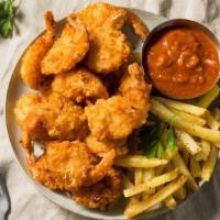 Coconut Shrimp Basket (8) · Comes with 8 pieces of coconut battered butterfly shrimps and your choice of regular, cajun ...