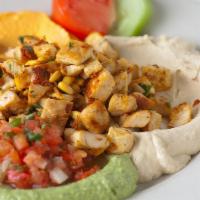 Hummus With Grilled Chicken · Grilled marinated all-natural chicken breast, choice of hummus, toasted pine nuts, and pita.