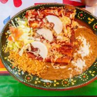 Enchiladas Rojas · Three cheese enchiladas come with beans, rice and lettuce.