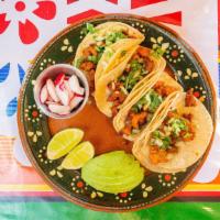 Al Pastor · Comes with pineapple,lime, avocado, onions and cilantro,radishes
