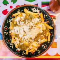 Papas Con Chile Y Queso · Cheese and green chili