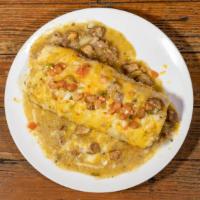California Burrito · Marinated carne asada, french fries, mexican cheeses, crema, guacamole, pico de gallo, salsa...