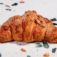 Almond Croissant · Handcrafted European butter croissant filled with smooth buttery lightly sweet almond cream.