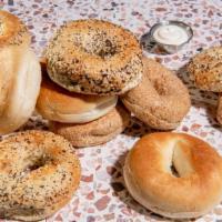 Bagel And Cream Cheese · Your choice of plain, Everything, Poppyseed, Cinnamon Raisin, Sesame Seed and Onion Bagel to...