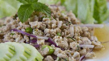 Larb · Ground chicken ,pork or beef tossed with toasted chili pepper, roasted rice, red onion, green onion, mint, lime juice, fish sauce, and cilantro.