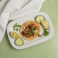 Pollo Taco · Popular. Grilled marinated chicken street taco includes onions and cilantro on top. Green sa...