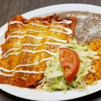 Enchiladas · Three soft rolled tacos filled with either cheese, chicken, or ground beef and topped with r...