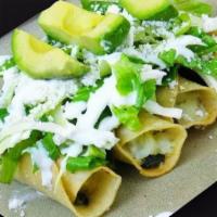 Tacos Dorados · Four rolled deep fried tacos, with chicken and cheese inside. Topped with lettuce, sour crea...