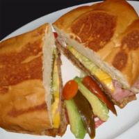 Torta/Torta Especial · Your choice of meat, along with beans, lettuce, tomato onions, jalapenos, avocado slices, an...