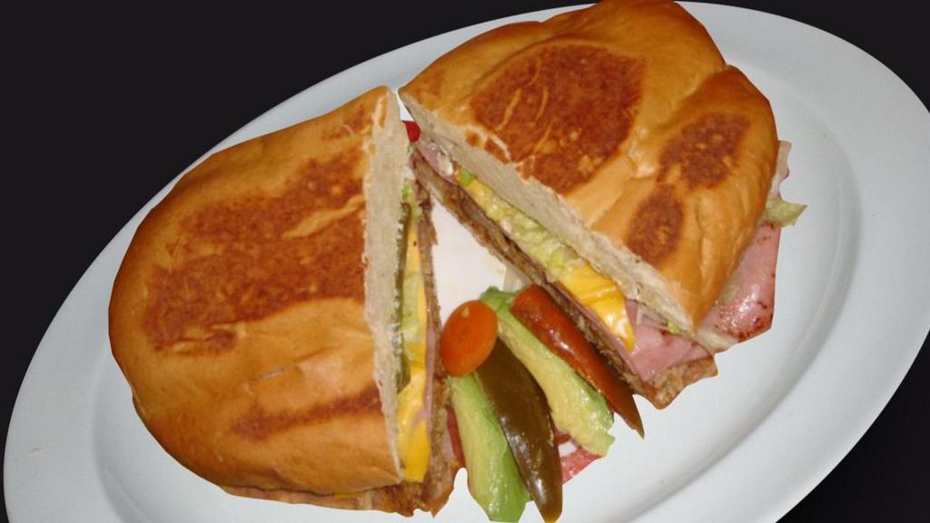 Torta/Torta Especial · Your choice of meat, along with beans, lettuce, tomato onions, jalapenos, avocado slices, and mayonnaise. Add ham and cheese for a Torta Especial.
