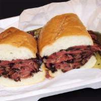 Pastrami Sandwich · Hot pastrami sandwich with sauteed onions, mustard, mayonnaise, and pickles. Served with fri...