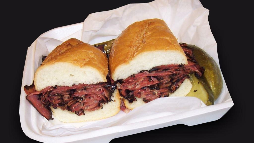 Pastrami Sandwich · Hot pastrami sandwich with sauteed onions, mustard, mayonnaise, and pickles. Served with fries.