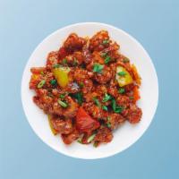 Chili Chicken Ching'S · Tender chunks of chicken marinated with ginger, garlic, chilies, batter fried and wok tossed...