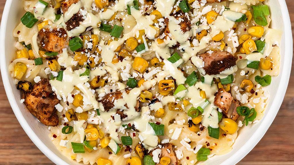 Elote Mac Bowl  · White Cheddar Mac and Southwest Chicken topped with Cotija Cheese, Roasted Corn, Green Onions, and Cilantro Chili Lime