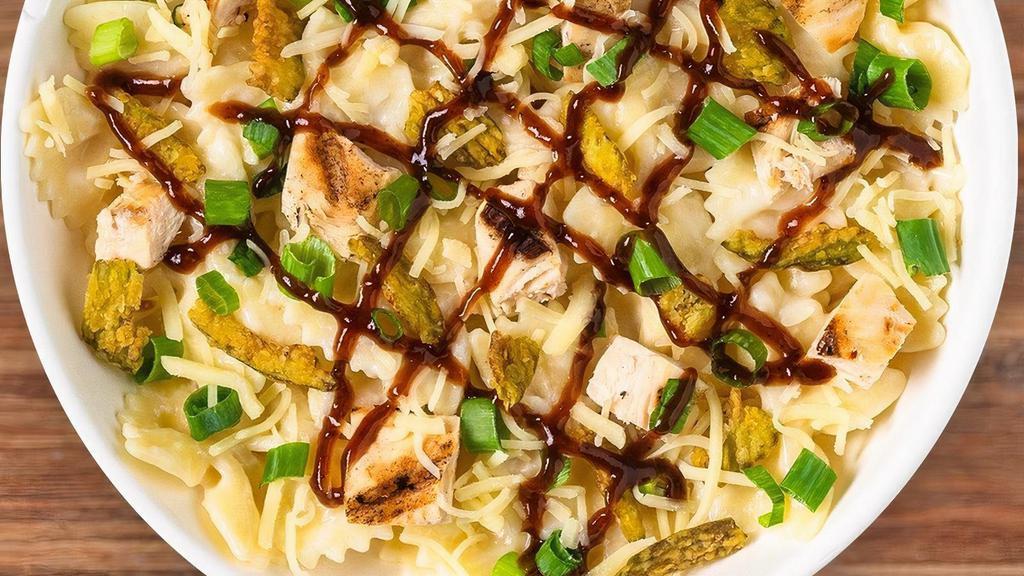 Bbq Mac Bowl · White Cheddar Mac and House Grilled Chicken topped with Jack Cheese, Jalapeno Crisps, Green Onions and BBQ Sauce