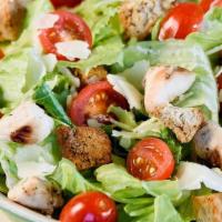 Mad Caesar · Romaine, House Grilled Chicken, Tomatoes, House-made Croutons, Parmesan with Caesar Dressing