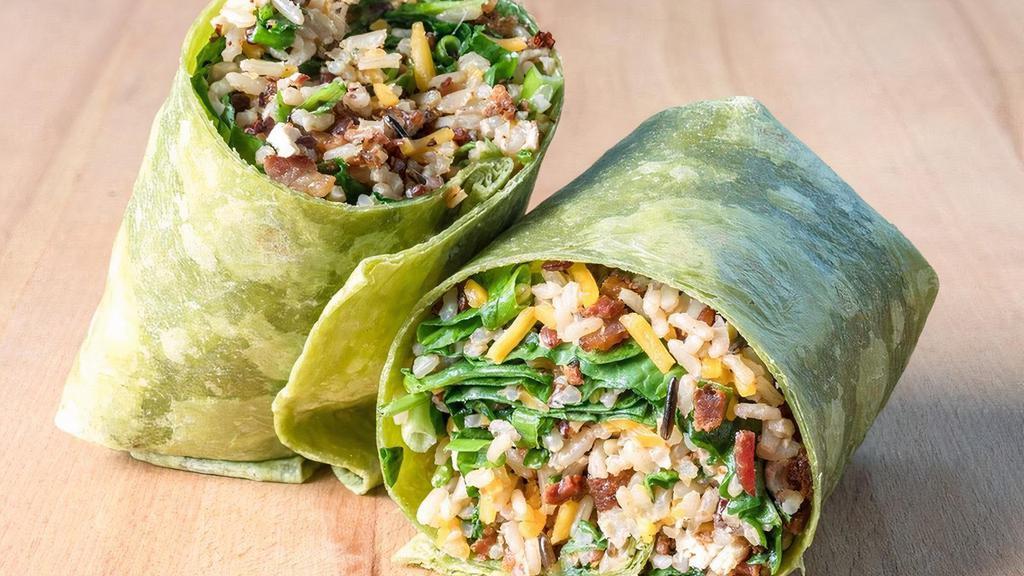 Spicy Bacon Wrap · Wild Rice Blend, House Grilled Chicken, Spinach, Green Onions, Cheddar Cheese, Bacon, MAD Spice with Sriracha Almond Vinaigrette in a Spinach Tortilla