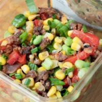 Cowboy Caviar With Chips · Bacon, Roasted Corn, Roasted Red Peppers, Edamame, Green Onions with Cilantro Chili Lime Dre...
