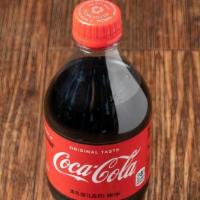 Coke · A delicious complement.