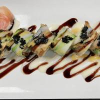 Black Dragon Roll · Crab meat salad,Shrimp Tempura, Cucumber. Top: Eel,avocado.black tobiko.