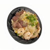 Tamashi Fried Rice · Beef,chicken,shrimp,white rice,egg,red/green bean,black pepper,green onion.