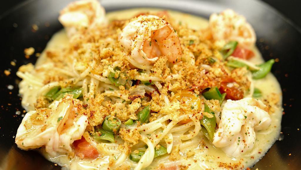 Shrimp Scampi Pasta · Wild Caught Shrimp, Market Vegetables, Shallots, Organic Heirloom Cherry Tomato, Shaved Garlic,  Organic Spaghetti Pasta.