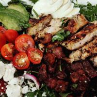 Cobb Salad · Gluten free. This traditional Cobb has avocado, cherry tomatoes, red onion, hard-boiled egg,...