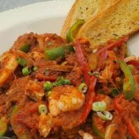 Cajun Jambalya · Andouille sausage, jumbo shrimp, grilled chicken breast, celery, bell pepper, onion, spicy C...
