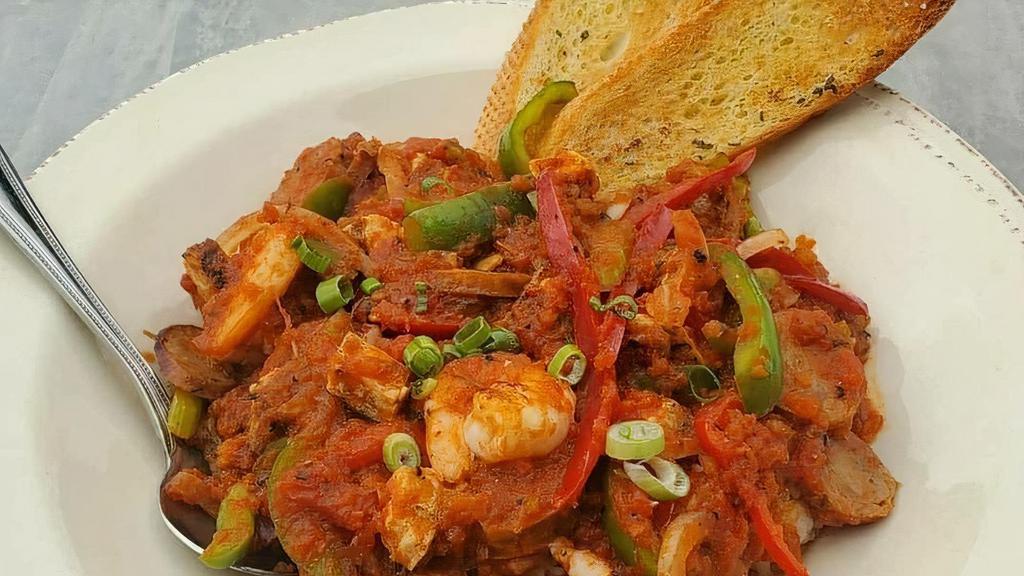 Cajun Jambalya · Andouille sausage, jumbo shrimp, grilled chicken breast, celery, bell pepper, onion, spicy Cajun broth, green onion on jasmine rice