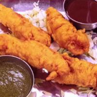 Chicken Pakora · Chicken tenders dipped in mildly spiced batter and deep fried.
