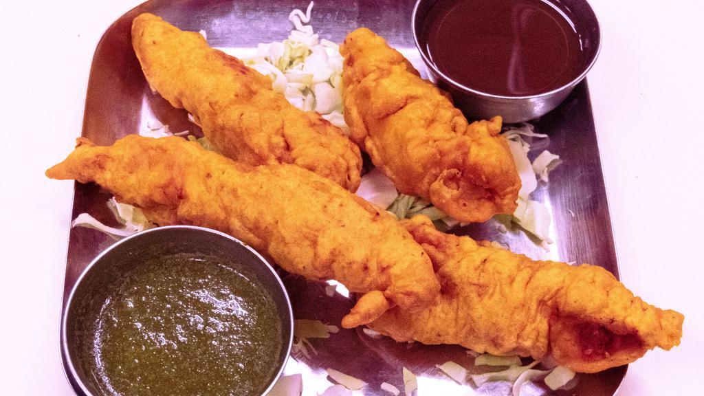 Chicken Pakora · Chicken tenders dipped in mildly spiced batter and deep fried.