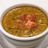 Palak Soup · Soup made with spinach tomatoes onions cream mild spices.