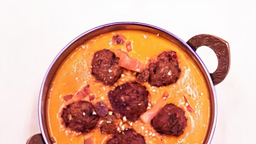 Malai Kofta · Vegetable balls deep fried and cooked with onions tomatoes cashew nuts cream and spices.