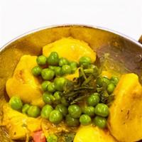 Aloo Mutter · Potatoes and green peas cooked with spices.