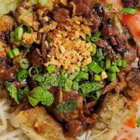 Combination Noodles Bowl · pork,chicken,beef and pork eggroll