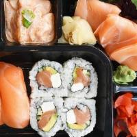 Salmon Lover Bento · Creamy Salmon Poke, 3 Salmon Sashimi, 2 Salmon Sushi, Philly Roll, Seaweed Salad, Pickled Ra...