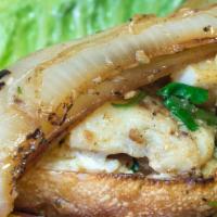 Alaskan Cod · Delectable pan-seared fish in garlic tapenade, fresh cilantro, pickled jalapenos, caramelize...