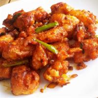 Tandoori Fish/Shrimp · Tandoori oven-cooked fish, shrimp.