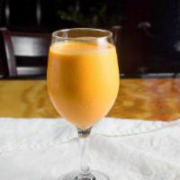 Mango Lassi · A special blend of mangoes and yogurt.