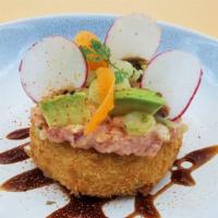 Causa Crocante Nikkei · Crispy Nikkei-style dish: mashed potato cake made with a base of ají amarillo, topped with t...