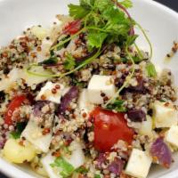 Solterito De Quinoa · Gluten free. Contains dairy. Parboiled quinoa mixed with fresh cheese, white onions, cherry ...