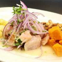 Ceviche Clásico · Gluten free. Fresh rockfish marinated in a delicious tiger milk, accompanied with sweet pota...