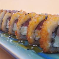 Furai Roll · Contains dairy. Roll stuffed with fresh salmon and cream cheese, breaded and deep-fried, ser...