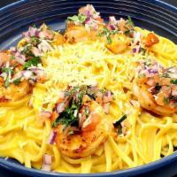 Pasta Huancaina Con Langostinos · Contains dairy. Pasta mixed in creamy huancaina sauce with grilled shrimp seasoned with anti...