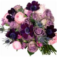 Romantic Waltz · PACKAGE DETAILS
- Light pink ranunculus, lavender roses, blue thistle, pink dianthus, and wi...