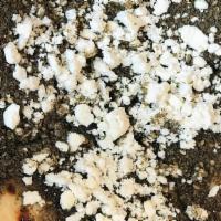 Zaatar & Cheese · Ground dried thyme, oregano and sesame seed with feta cheese on pita bread.