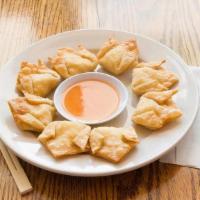 Crab Puffs (8 Pcs) · Individually hand wrapped, filled with seasoned cream cheese and crab meat.
